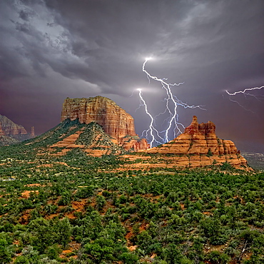 Lightning striking in between Courthouse Butte and Bell Rock near Sedona, Arizona, United States of America, North America