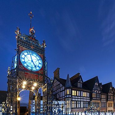 The Victorian Eastgate Clock on the city walls at night, Eastgate Street, Chester, Cheshire, England, United Kingdom, Europe