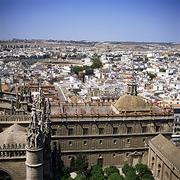 Cathedral, and bullring in distance, Seville, Andalucia, Spain, Europe