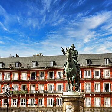 Equestrian statue of Philip III in front of residential buildings on the Plaza Mayor, Madrid, Spain, Europe