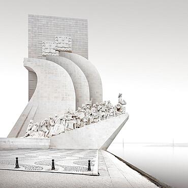 Black and white long exposure of the seafarers' monument Padrao dos Descobrimentos on the river Tejo in Lisbon, Portugal, Europe