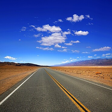 Deserted Route 190 highway in heart of Death Valley California