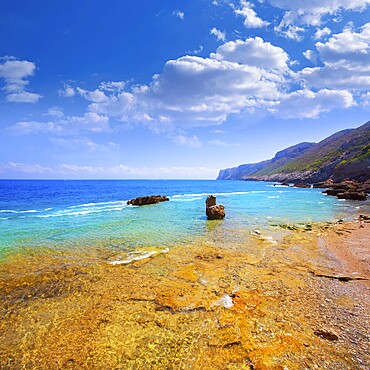 Denia Alicante Las rotas rocky beach in Spain and San Antonio Cape