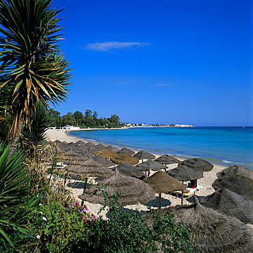 View along beach to the medina from the Sindbad Hotel, Hammamet, Cap Bon, Tunisia, North Africa, Africa