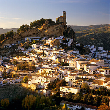 View over the whitewashed houses and old Moorish castle at sunset, Montefrio, Granada Province, Andalucia, Spain, Europe