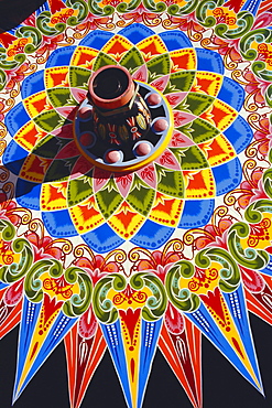 Traditionally painted oxcart wheel, Costa Rica