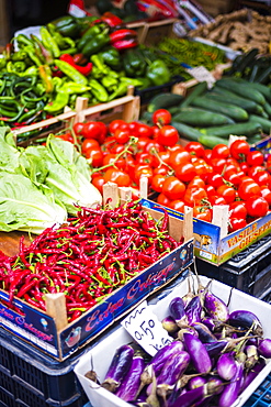 Chillies and tomatoes for sale at Capo Market, a fruit, vegetable and food market in Palermo, Sicily, Italy, Europe 