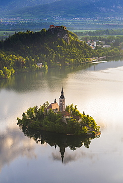 Lake Bled Island and Bled Castle at sunrise, Julian Alps, Gorenjska, Slovenia, Europe