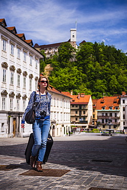 Tourist with suitcase, Ljubljana, Slovenia, Europe