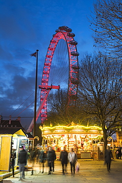 Christmas Market in Jubilee Gardens, with The London Eye at night, South Bank, London, England, United Kingdom, Europe