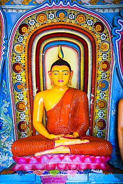 Colourful Buddha statue at Isurumuniya Vihara, Anuradhapura, UNESCO World Heritage Site, Sri Lanka,Asia