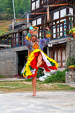 Bhutanese people performing the masked Cham Dance, Paro, Bhutan, Asia