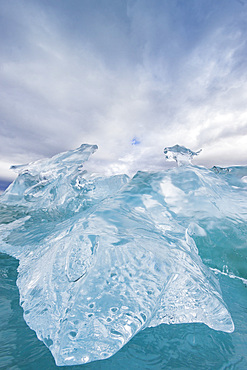 Glacial iceberg detail from ice calved off the LeConte Glacier near Petersberg, Southeast Alaska, USA, Pacific Ocean.