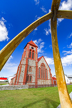 Blue whale mandibles frame the Anglican Christ Church Cathedral in Stanley, Falkland Islands, South Atlantic Ocean.