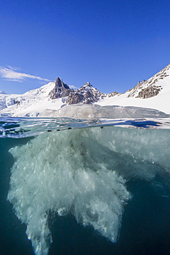 Above and below view of glacial ice in Orne Harbor, Antarctica, Polar Regions