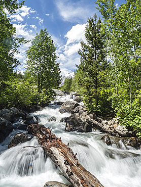 Snow melt cascades leading to Taggart Lake, Grand Teton National Park, Wyoming, United States of America, North America