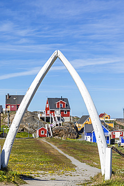 The town of Sisimiut as seen through whale jawbone arch, Western Greenland, Polar Regions