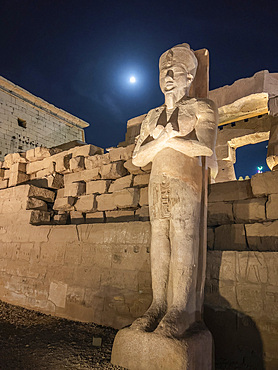 The Luxor Temple at night, under a full moon, constructed approximately 1400 BCE, UNESCO World Heritage Site, Luxor, Thebes, Egypt, North Africa, Africa