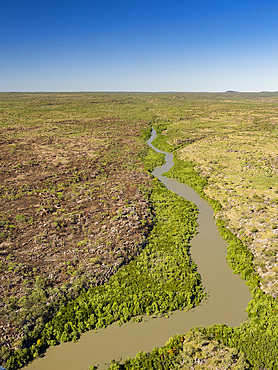 A view of the Mitchell River meandering towards Swift Bay as seen from a commercial helicopter, Kimberley, Western Australia, Australia, Pacific