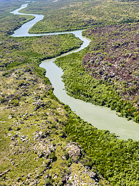 A view of the Mitchell River meandering towards Swift Bay as seen from a commercial helicopter, Kimberley, Western Australia, Australia, Pacific