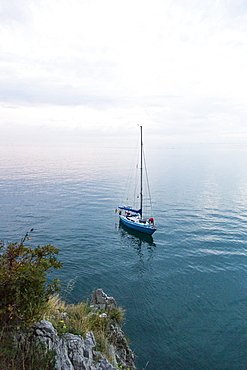 Sailing boat anchoring near coast, Gulf of Trieste, Gorizia, Friuli Venezia Giulia, Italy