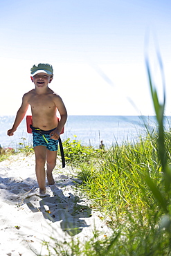 Boy, 5 years old, on the beach, dream beach between Strandmarken und Dueodde, sandy beach, summer, Baltic sea, Bornholm, Strandmarken, Denmark, Europe, MR