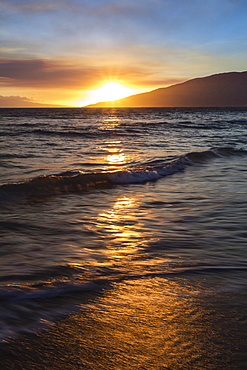 A sunset view with soft water from North Kihei, Maui, Hawaii, United States of America