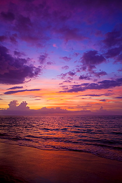 Sunset colours lighting oup clouds and ocean, Wailea, Maui, Hawaii, United States of America