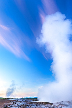 Strokkur geyser erupting at dusk, Geysir, Iceland