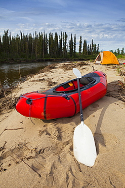 Tent and packraft on sandy beach on the Charley River, Yukon–Charley Rivers National Preserve, Alaska, United States of America