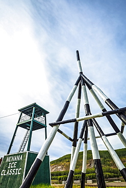 Display of Nenana Ice Classic tripod for 2016 and tower by Tanana River, Interior Alaska in summertime; Nenana, Alaska, United States of America