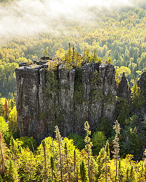 Sunrise over a misty, foggy valley in the Canadian Shield; Dorian, Ontario, Canada