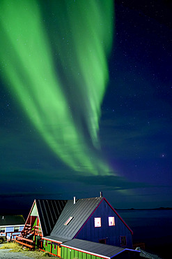 Northern Lights over the coastline and houses of Nuuk, Greenland; Nuuk, Sermersooq, Greenland