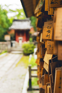 Scriptures written in Japanese on wooden tiles at a temple; Kyoto, Kansai, Japan