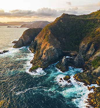 Drone view of Pengempos, Areguling Beach at sunset; Lombok, Indonesia