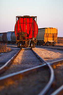 Freight trains on tracks after a switching station; Alberta, Canada