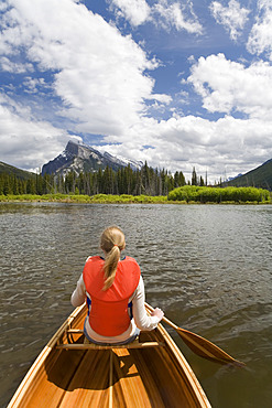 Girl Canoeing in Vermilion Lakes, Banff National Park, Alberta, Canada