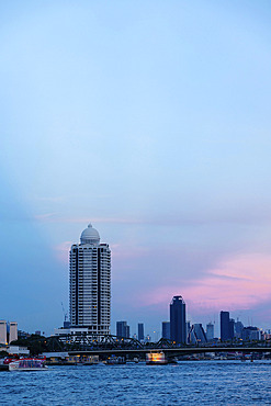 View of Bangkok at dusk along the Chao Phraya River in Thailand, Bangkok, Bangkok, Thailand