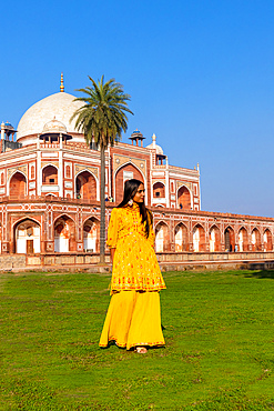 Young Indian Girl in front of Humayun's Tomb, UNESCO World Heritage Site, Delhi, India, South Asia, Asia