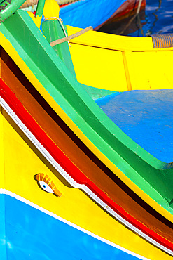 A Colourful Luzzu with the Eye of Osiris in Marsaxlokk Harbour, Marsaxlokk, Malta, Southern Europe