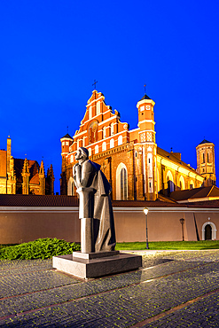 A Statue of the Polish Poet Adam Mickiewicz in front of St. Anne's Church and the Church of St. Francis and St. Bernard, Vilnius, Lithuania, Northern Europe