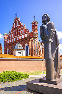 A Statue of the Polish Poet Adam Mickiewicz in front of St. Anne's Church and the Church of St. Francis and St. Bernard, Vilnius, Lithuania, Northern Europe