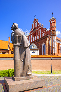 A Statue of the Polish Poet Adam Mickiewicz in front of St. Anne's Church and the Church of St. Francis and St. Bernard, Vilnius, Lithuania, Northern Europe
