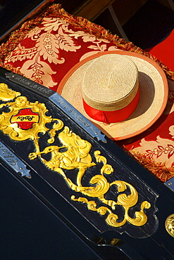 Detail of gondola and gondolier's hat, Venice, Veneto, Italy, Europe