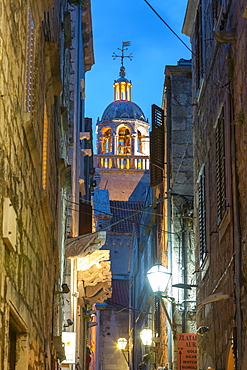 St. Marko Bell Tower illuminated at dusk, Stari Grad (Old Town), Korcula Town, Korcula, Dalmatia, Croatia, Europe