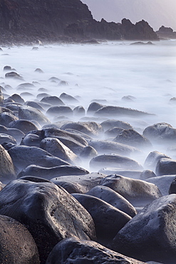 Basalt boulders in the ocean, El Golfo, UNESCO Biosphere Reserve, El Hierro, Canary Islands, Spain, Atlantic, Europe