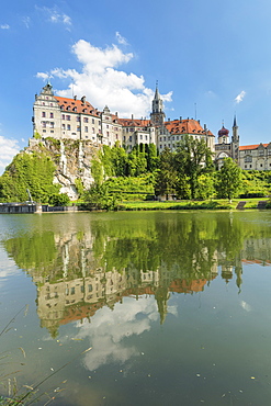 Sigmaringen Castle reflecting in Danube river, Upper Danube Valley, Swabian Jura, Baden-Wurttemberg, Germany, Europe