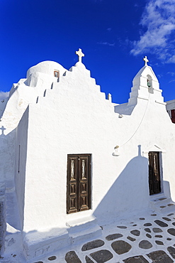 Whitewashed Panagia Paraportiani, Mykonos most famous church, under a blue sky, Mykonos Town (Chora), Mykonos, Cyclades, Greek Islands, Greece, Europe