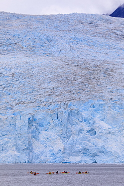 Colourful kayaks, Aialik Glacier, blue ice, Harding Icefield, Kenai Fjords National Park, near Seward, Alaska, United States of America, North America