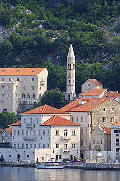 Church of Our Lady of the Rosary lit by early morning light, Perast, Bay of Kotor, UNESCO World Heritage Site, Montenegro, Europe